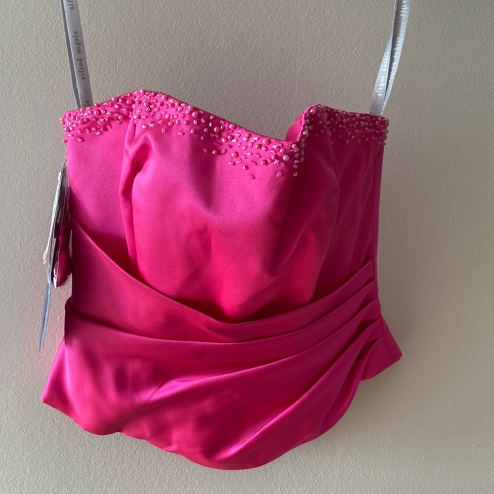 Alfred Angelo hot pink dress. Can be worn as a grad dress or bridesmaid
